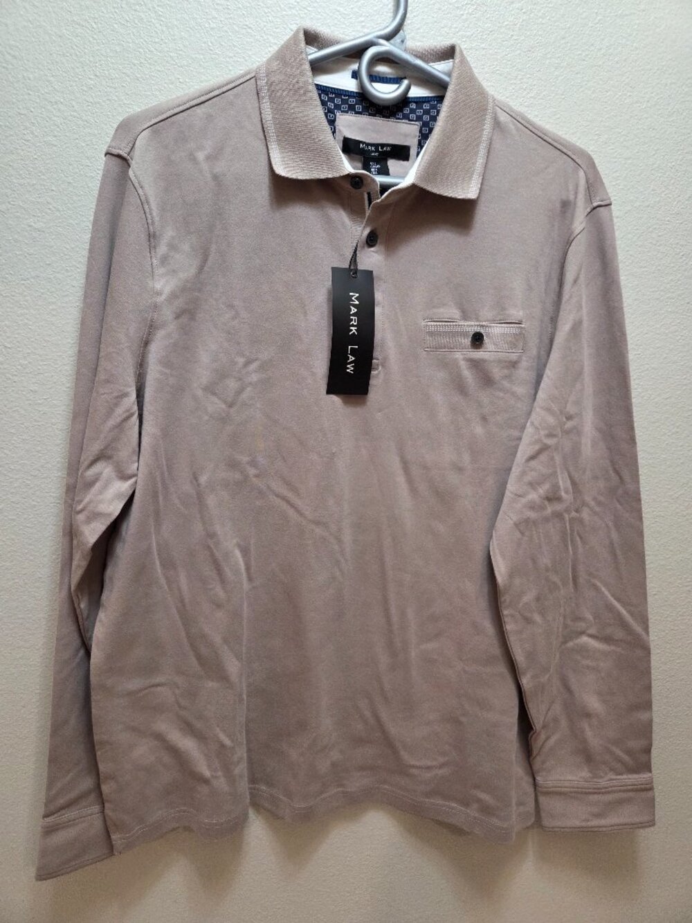 Beige long-sleeve polo shirt from Mark Law featuring a buttoned chest pocket